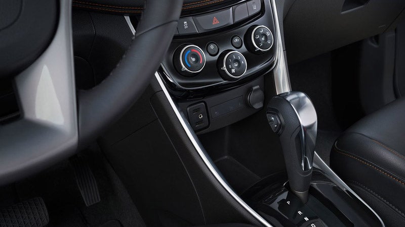 Interior View of Chevrolet Trax showcasing the steering wheel and various controls on the dashboard.