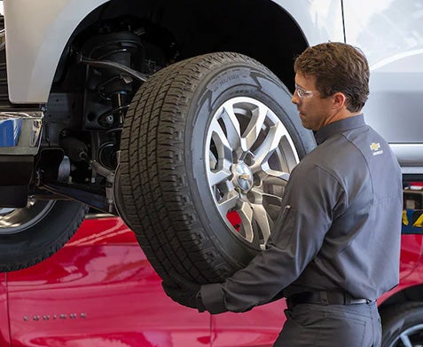 Technician changing a tire
