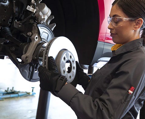 Technician changing a tire